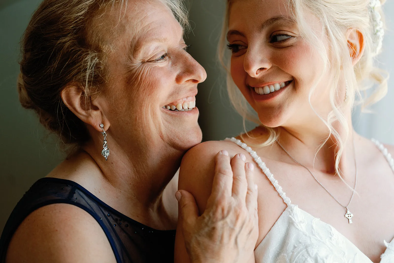 Colette laughing with her mother before the ceremony